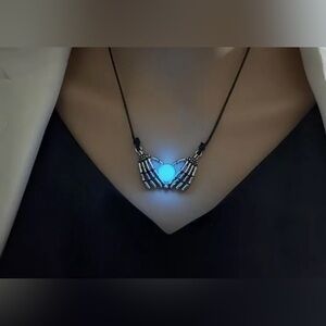 Skeleton Hands Necklace with glow Stone